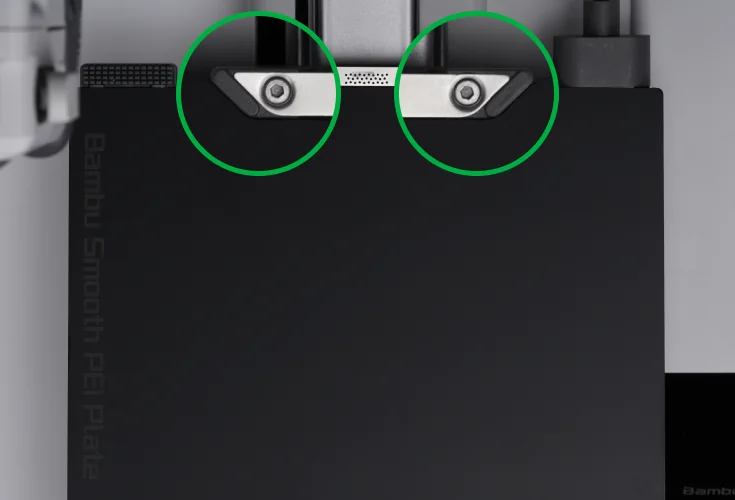 Step 1: Align the plate with the fixed points of the platform with the name of the plate facing you